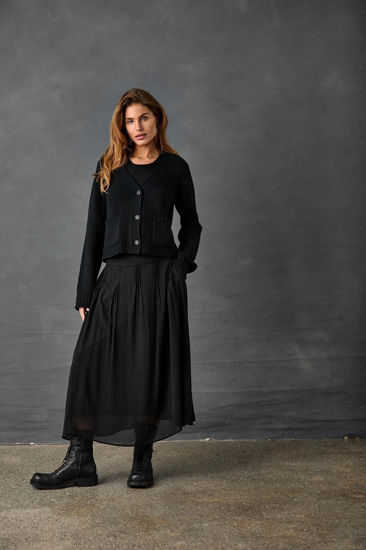 Black Pleated Skirt with Knitted Cardigan