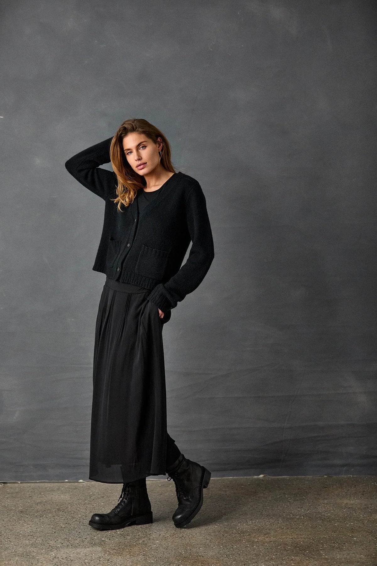 Black Pleated Skirt with Knitted Cardigan
