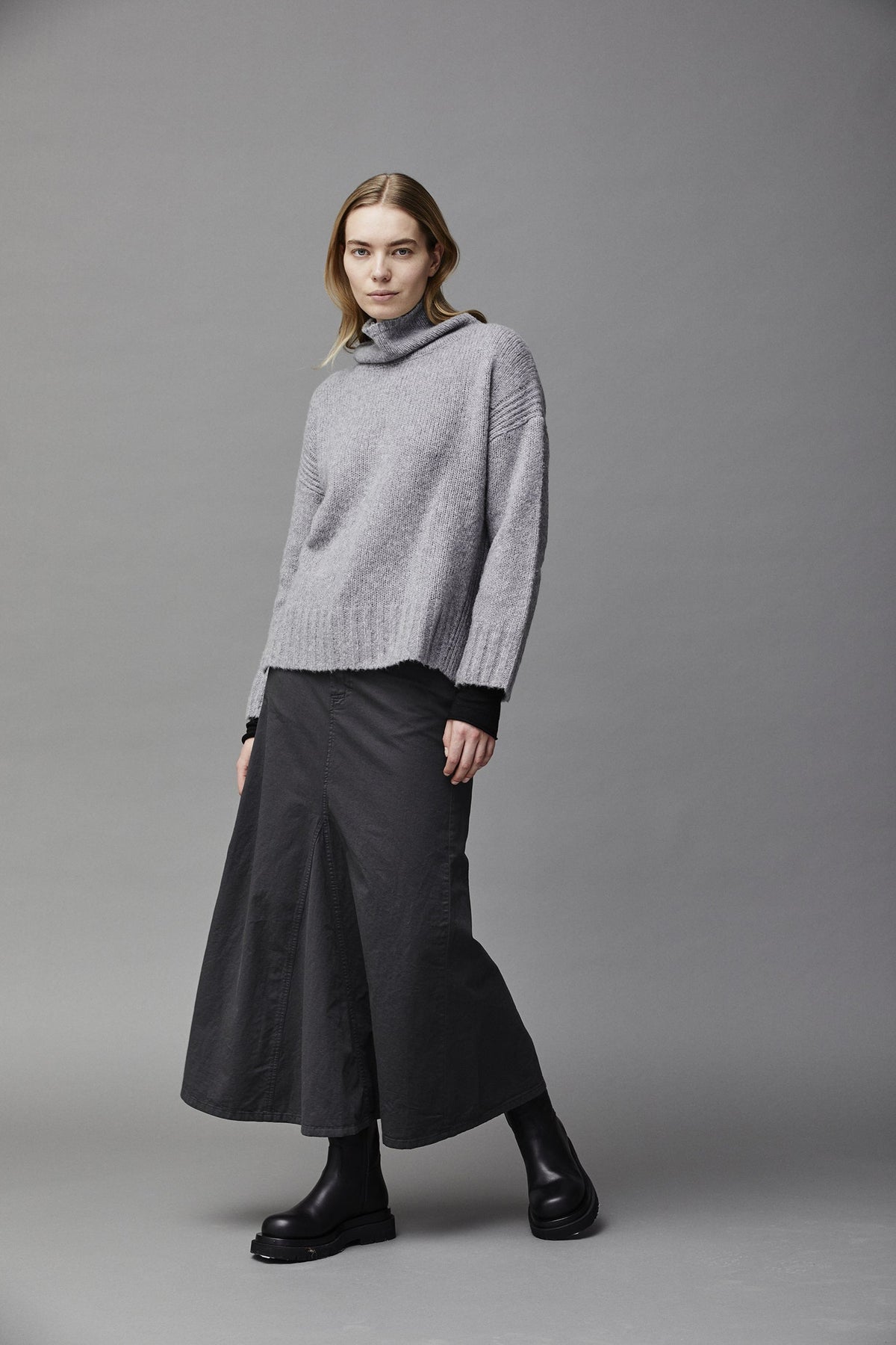 Black Minimalist Midi Skirt with Drape Effect