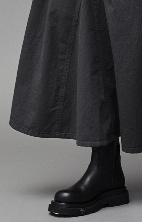 Black Minimalist Midi Skirt with Drape Effect