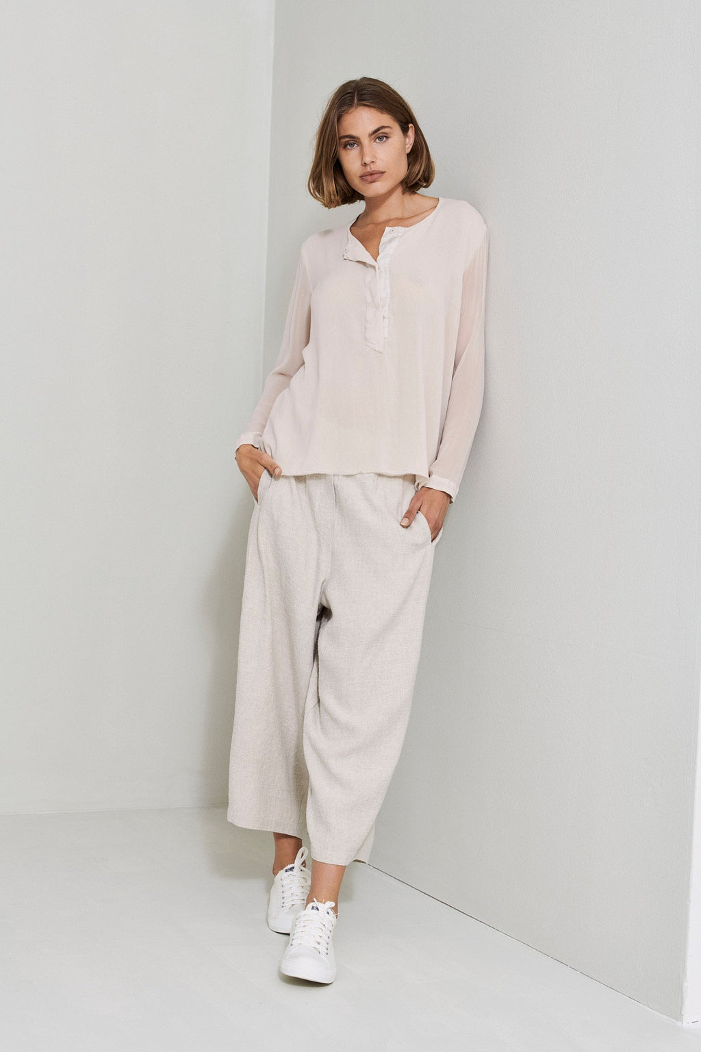 Light Pink Long Sleeved Button Decorated V-Neck Shirt