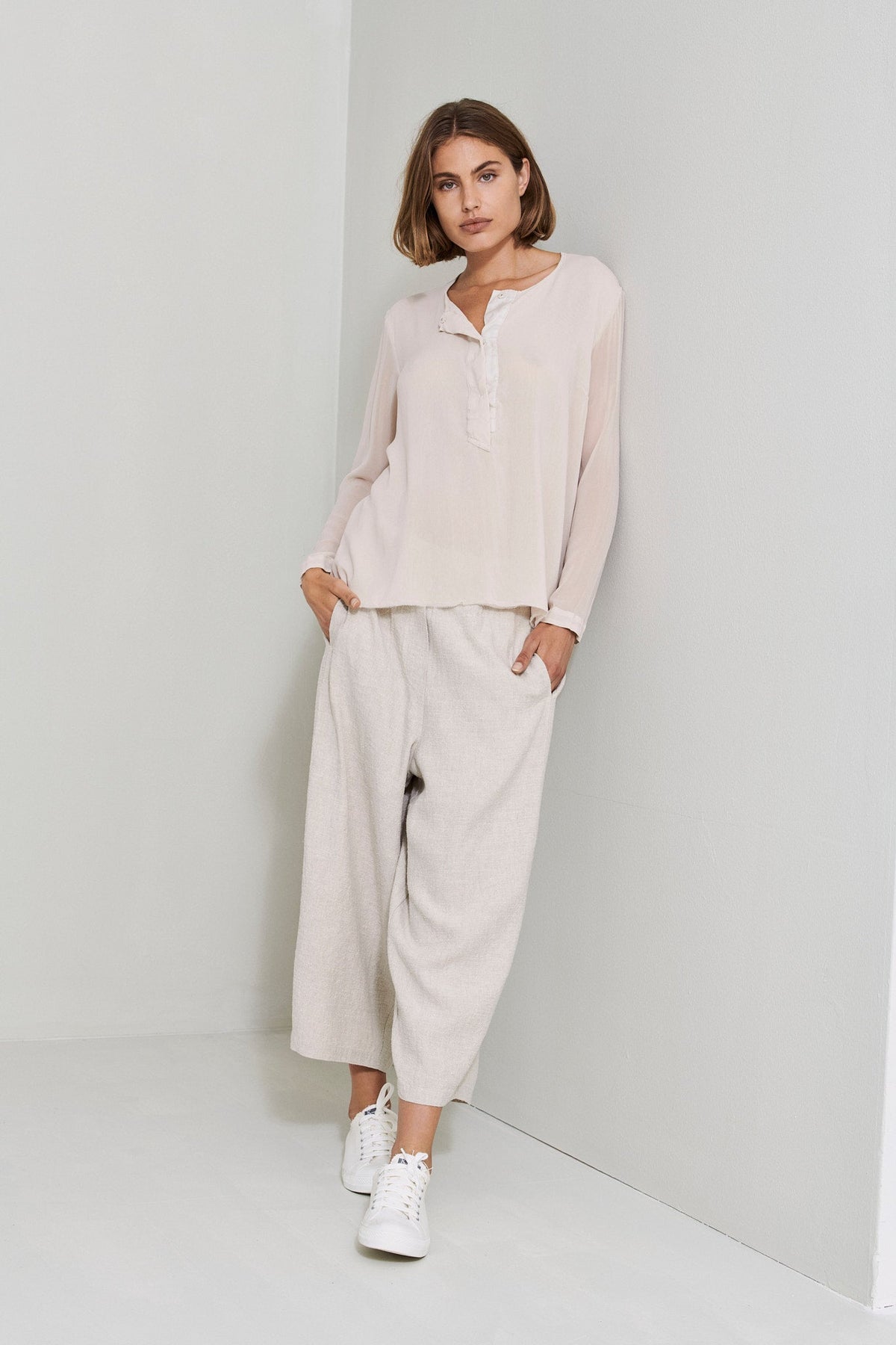 Light Pink Long Sleeved Button Decorated V-Neck Shirt