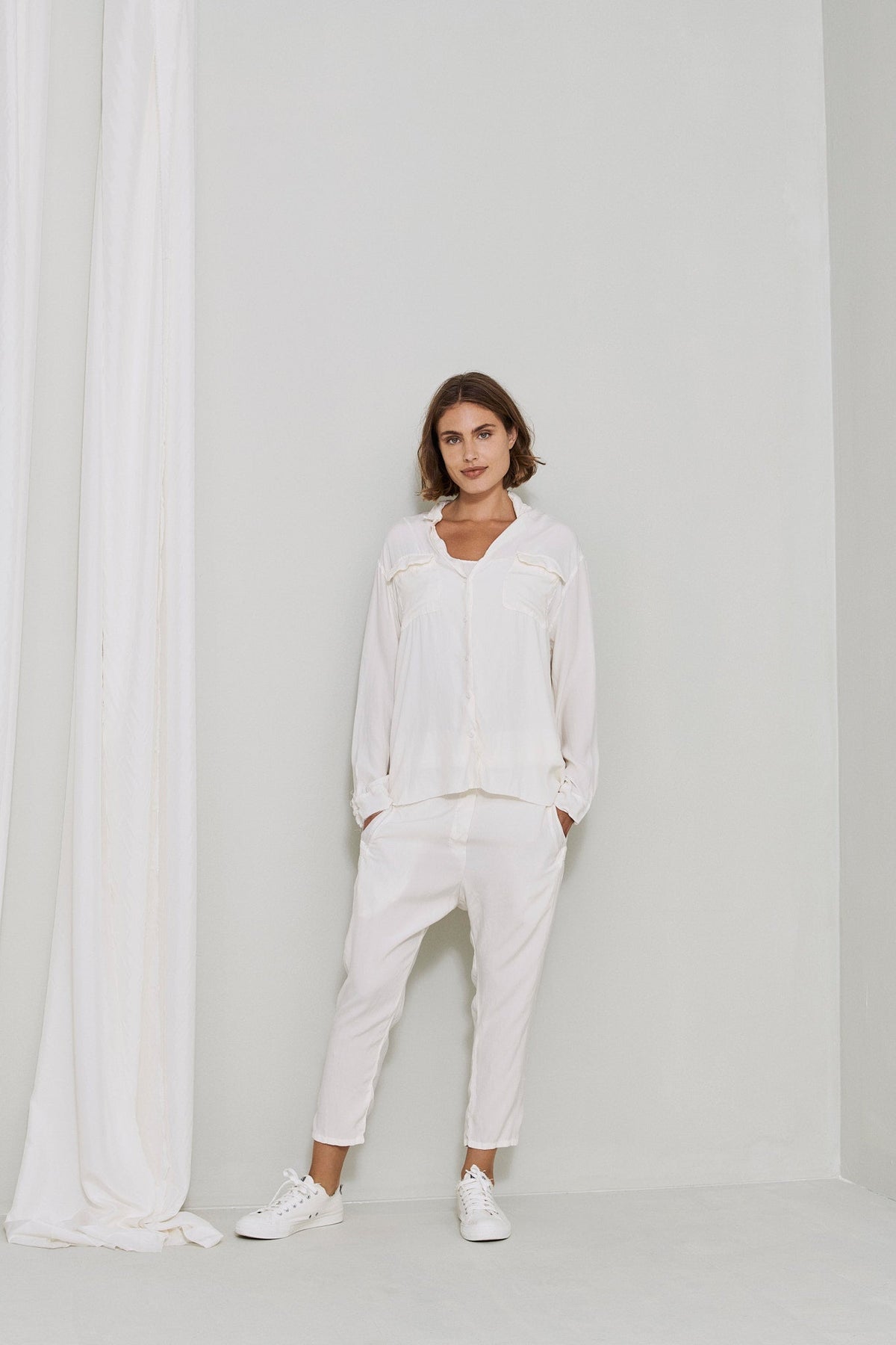 White Long Sleeved Turn Down Collar Button Pocket Blouse