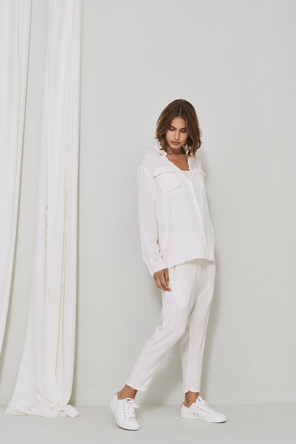 White Long Sleeved Turn Down Collar Button Pocket Blouse